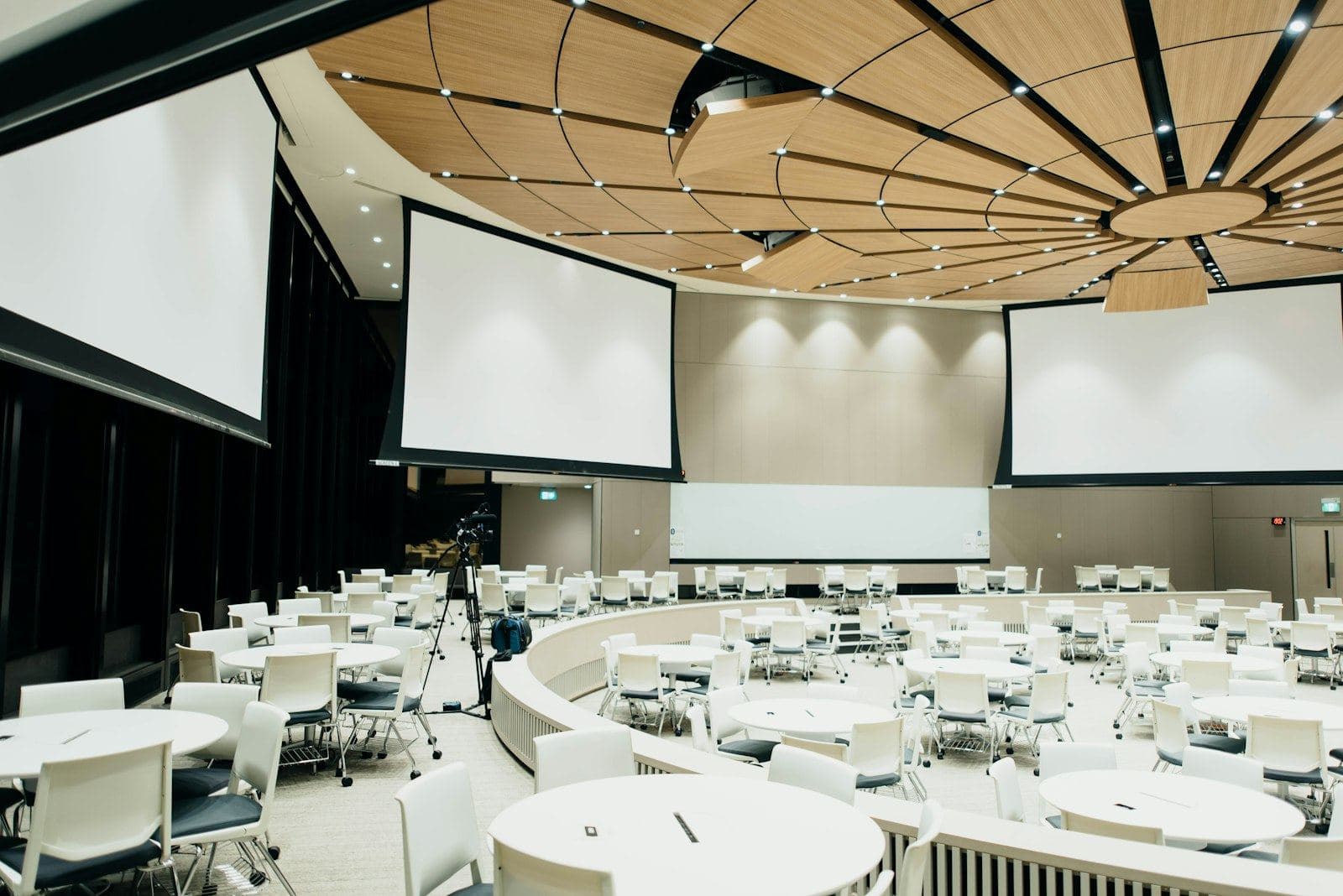 Corporate event hall with stage and seating